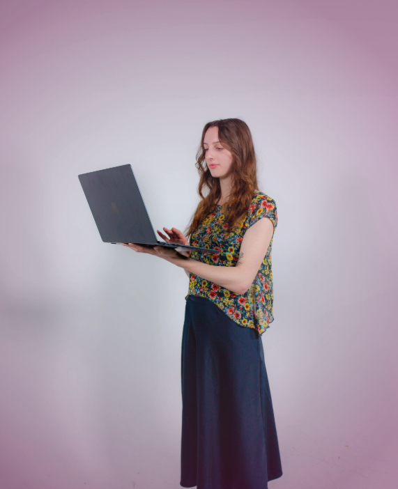 Sophia strategizing seo workflow holding computer